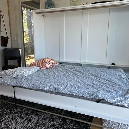 Saunamoekki Saaressa بيت خشبي